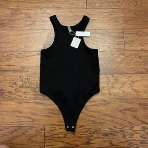 BRAND NEW- NEVER WORN. WITH TAGS. Razor Back Bodysuit